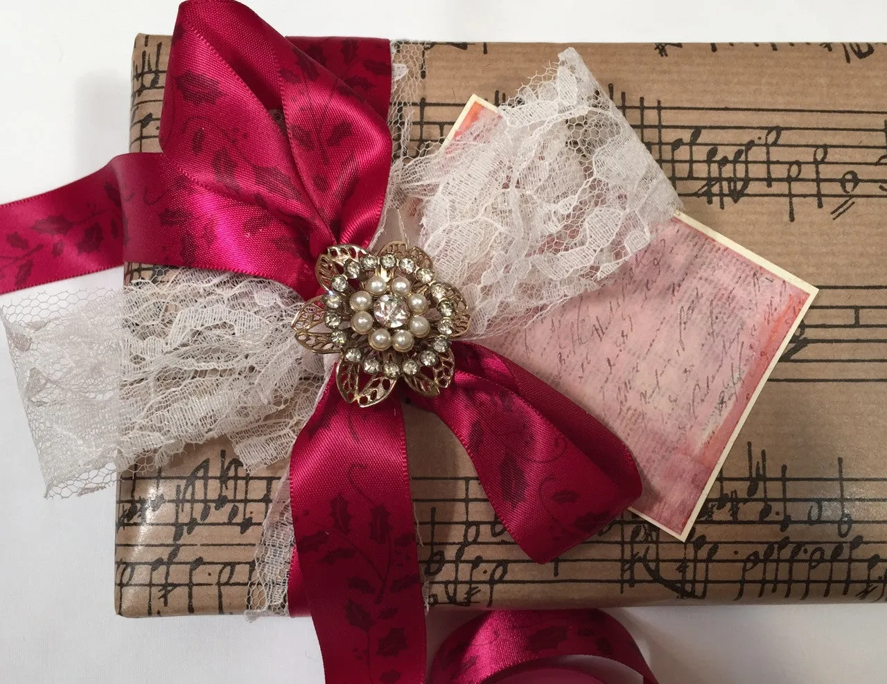 Holly Leaves Ribbon in burgundy on 7/8" Ruby Red Single Face Satin Ribbon